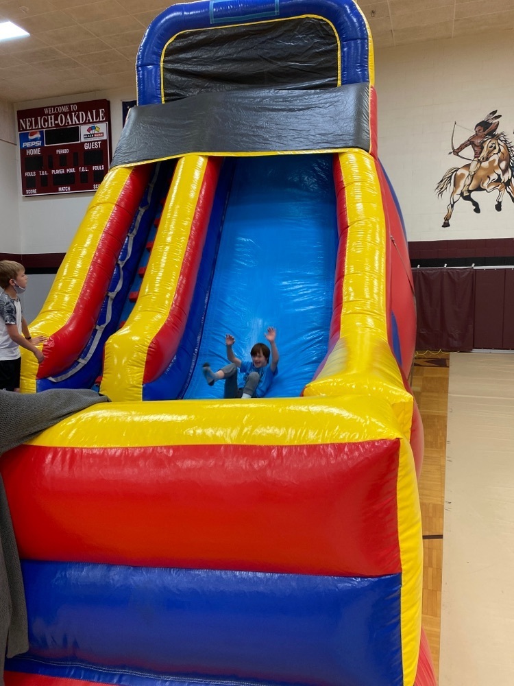 3rd and 4th graders enjoying the inflatables