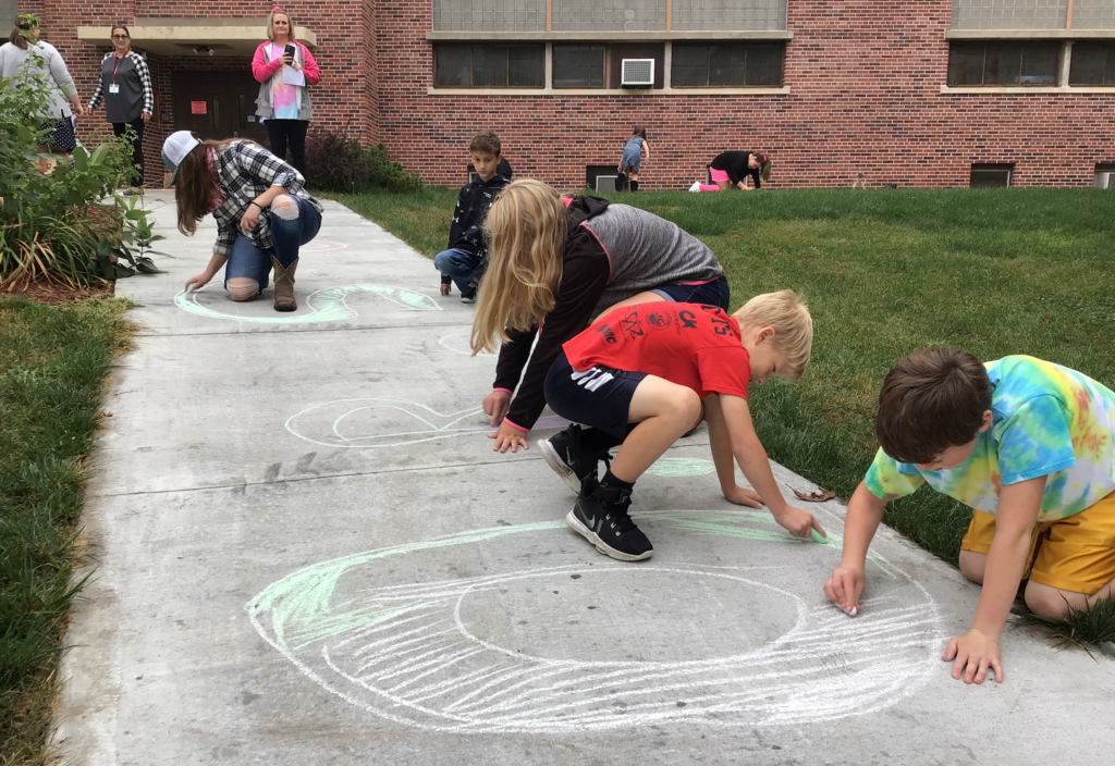 Homecoming sidewalk chalk